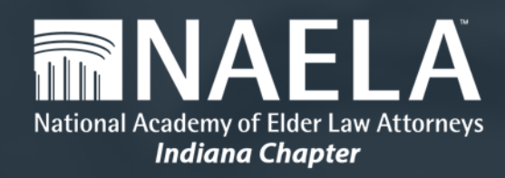 Two cats cuddle closely in a box, with one having orange fur and the other black and white. Their peaceful interaction highlights their bond.